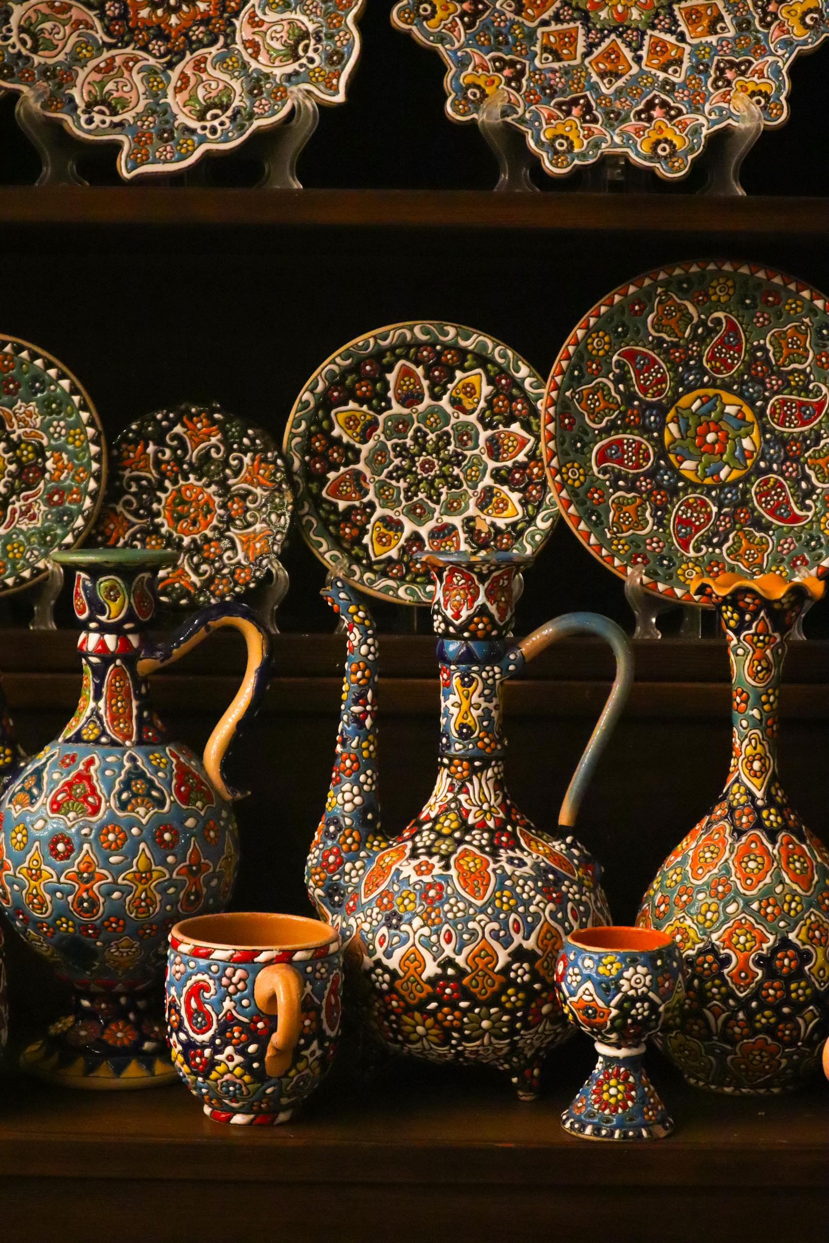 Vibrant traditional ceramics with intricate designs showcased in Dubai's art scene.